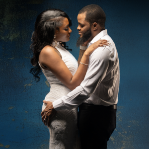 A man and woman standing next to each other.