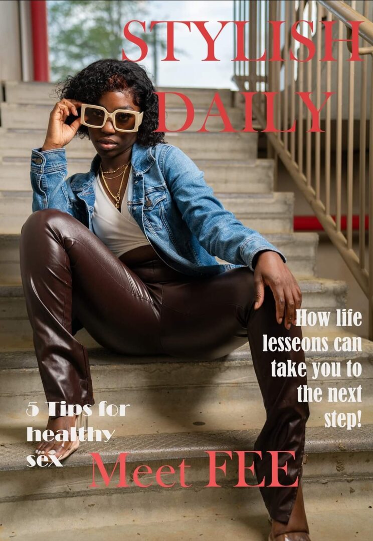 A woman sitting on steps wearing brown pants and sunglasses.